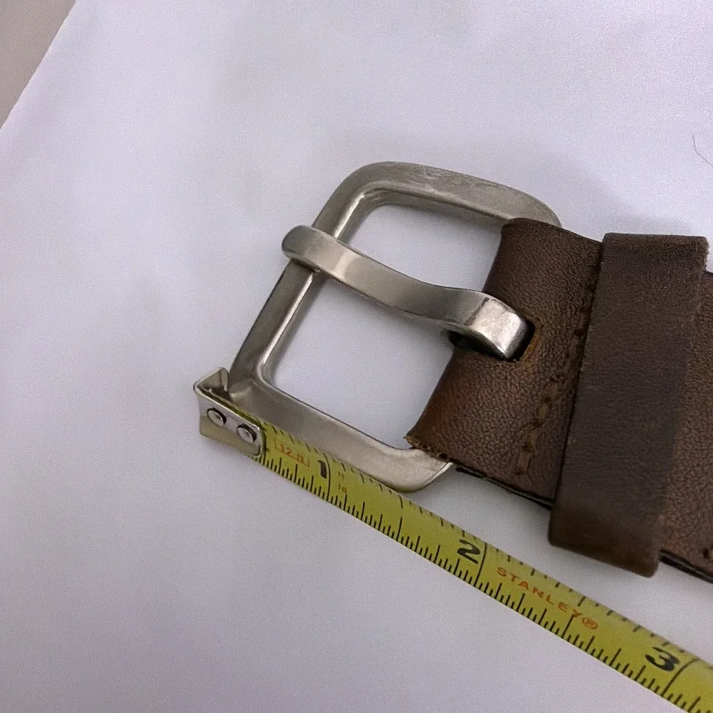 Dark Brown Leather belt with silver buckle and accents. Size XL